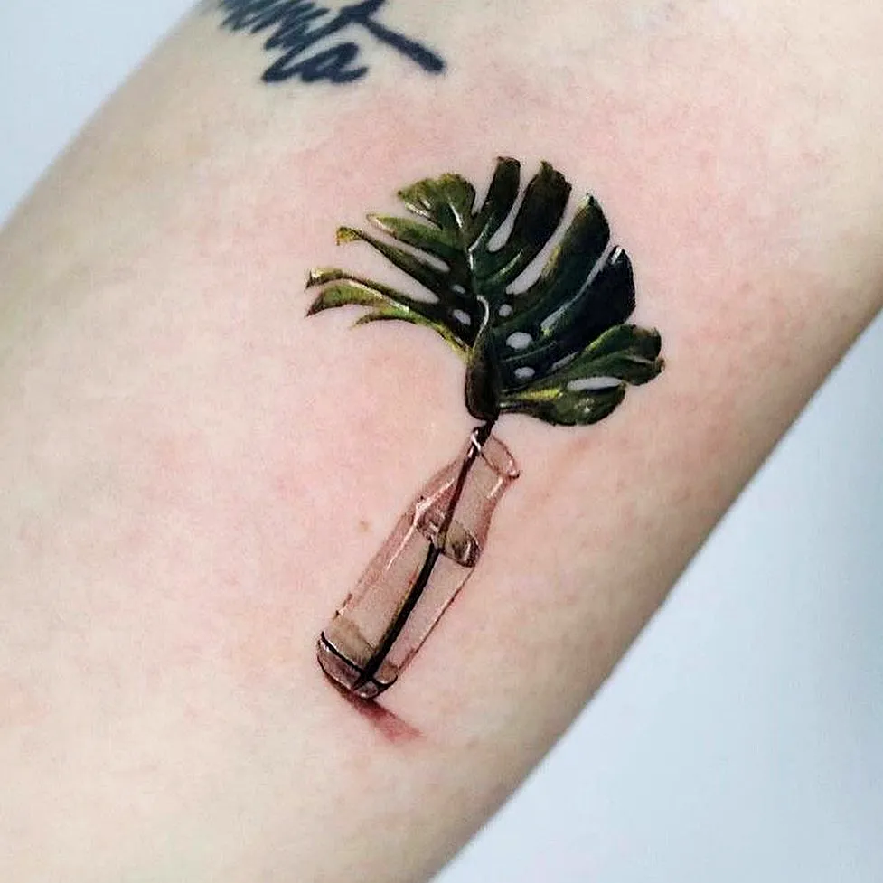 Monstera Plant Bottle Arm Tattoo