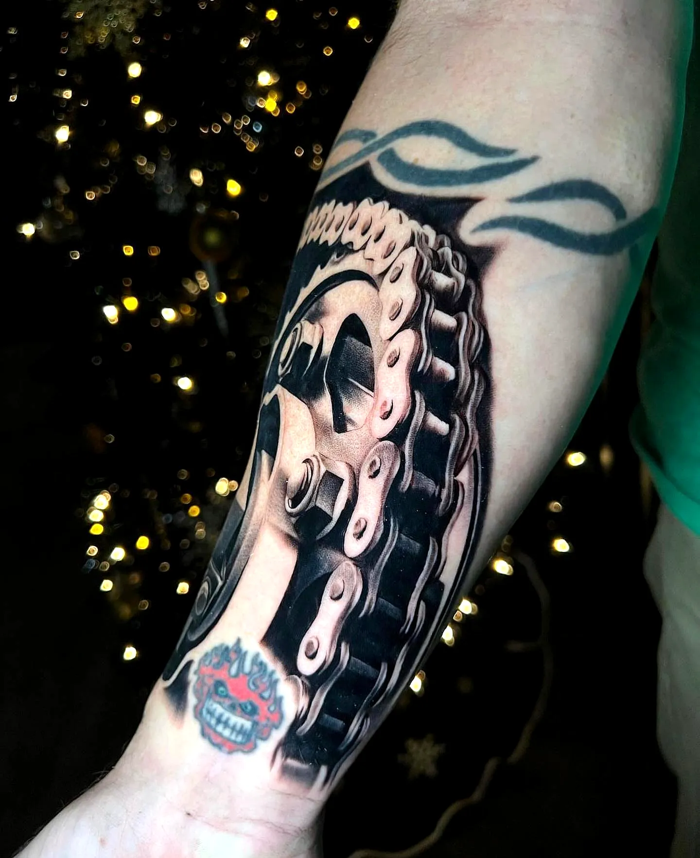 Motorcycle Chain Skull Forearm Tattoo