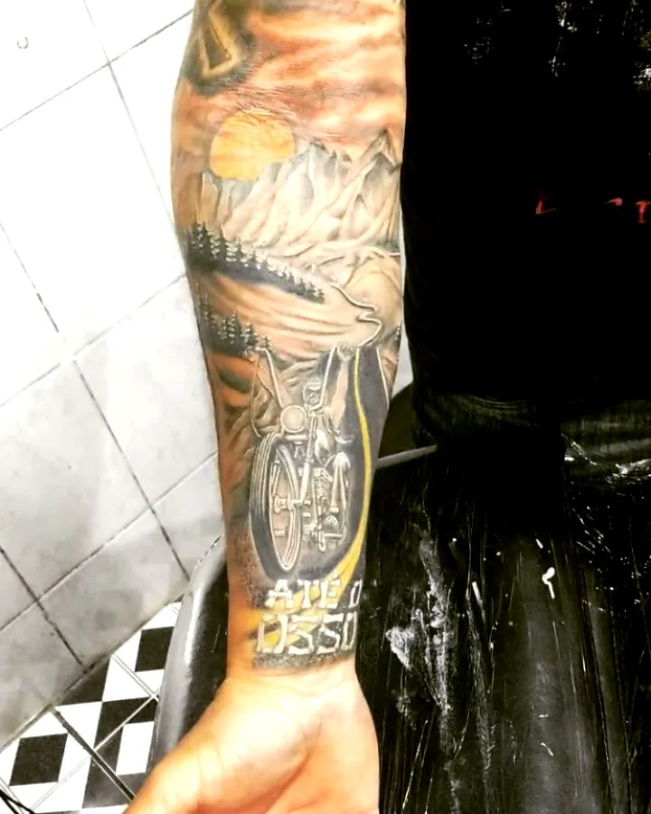 Motorcycle Forearm Tattoo with Landscape