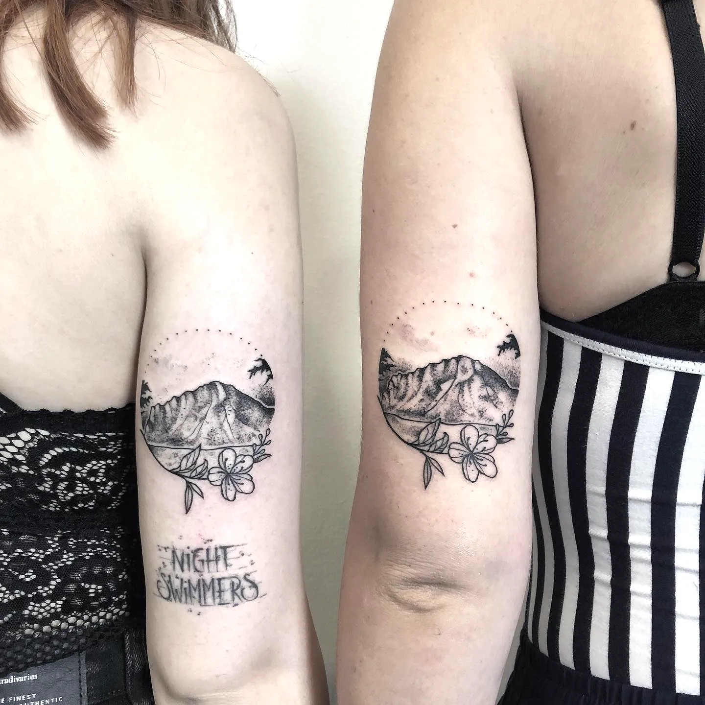Mountain landscape arm tattoo