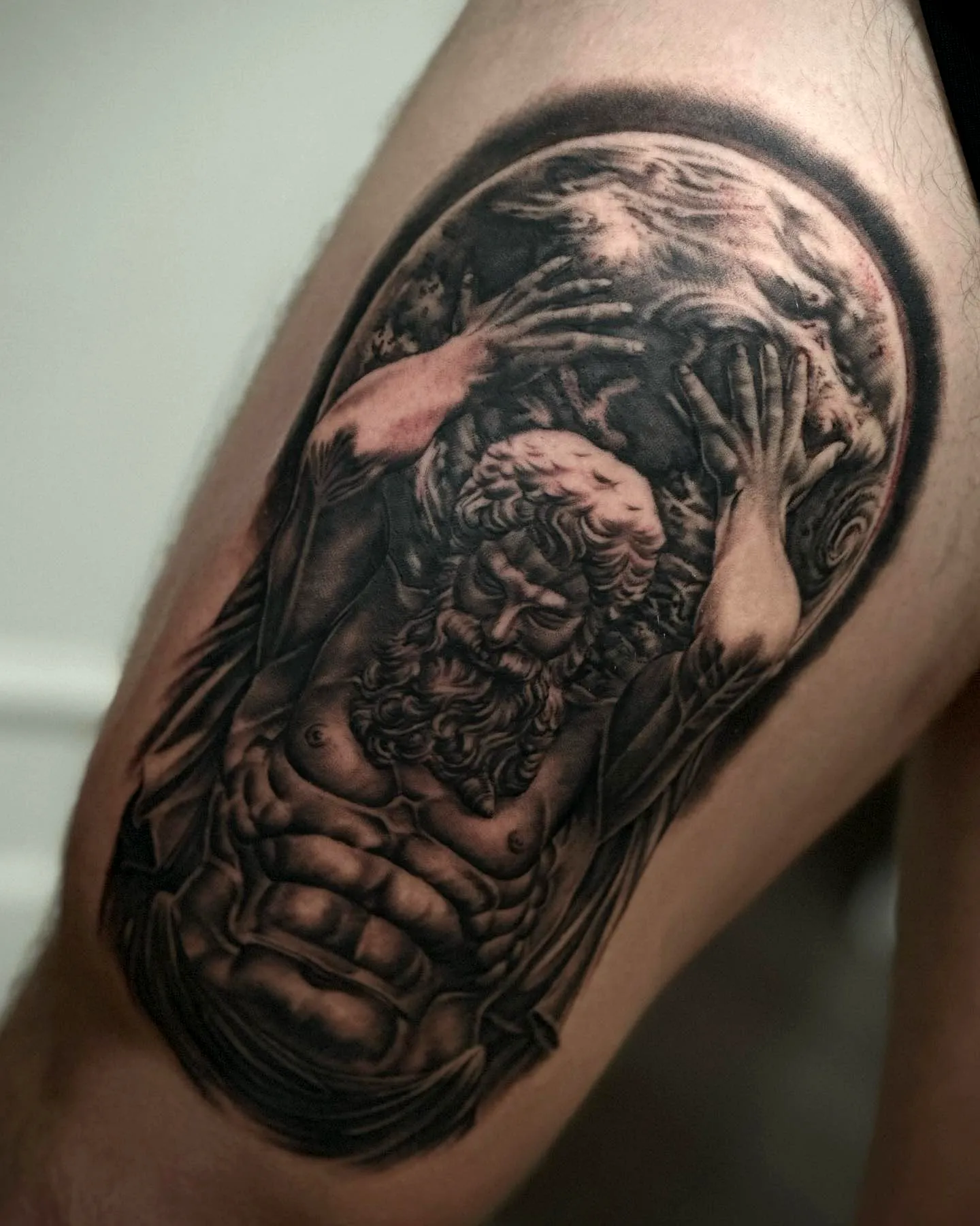 Muscular Greek Deity Thigh Tattoo