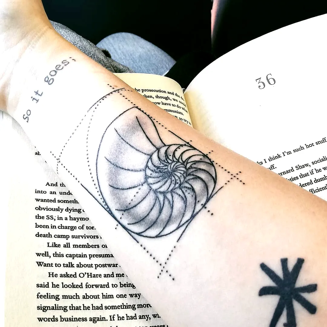 Nautilus Shell Forearm Tattoo Design