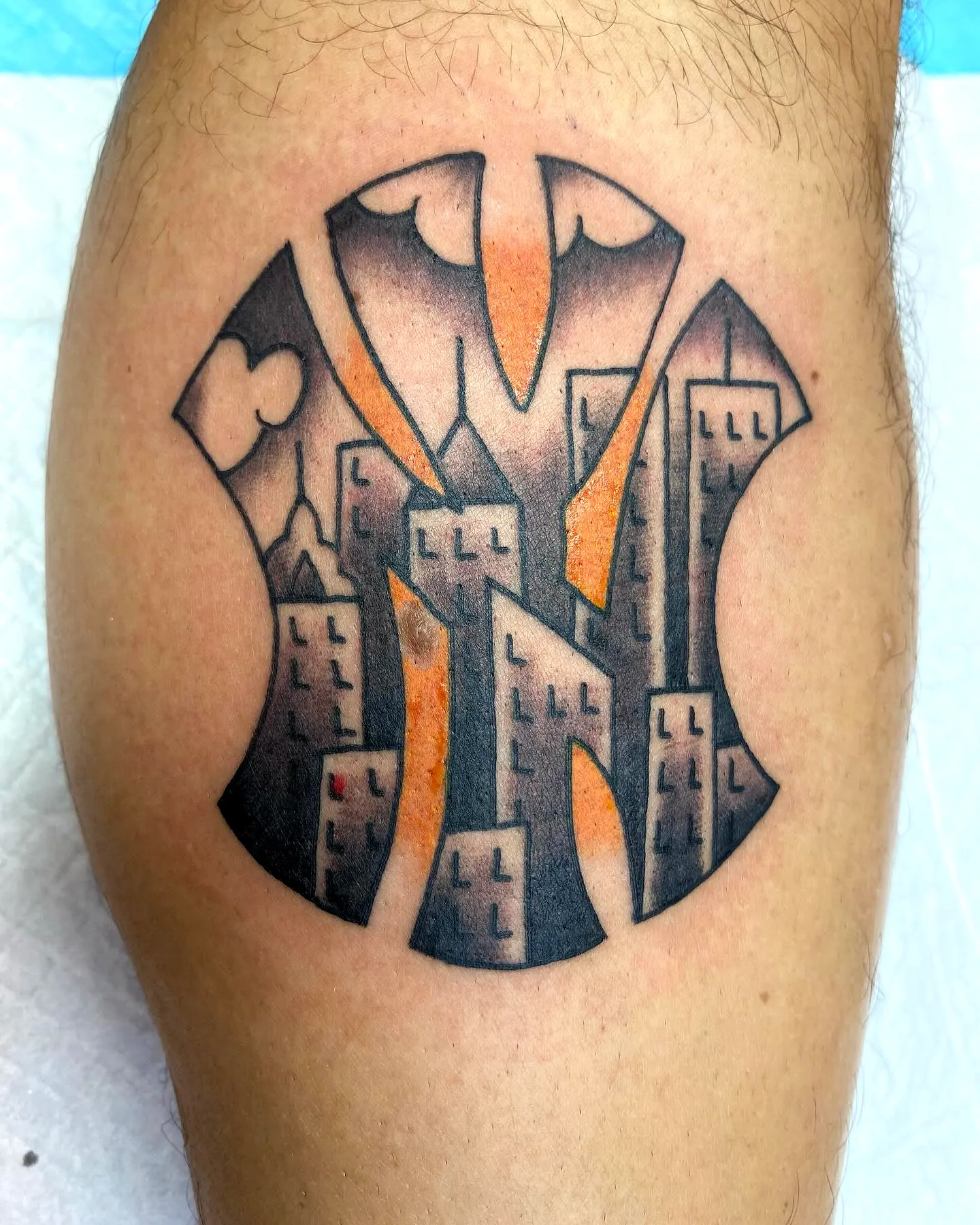 NY Skyline Leg Tattoo with Color Detail