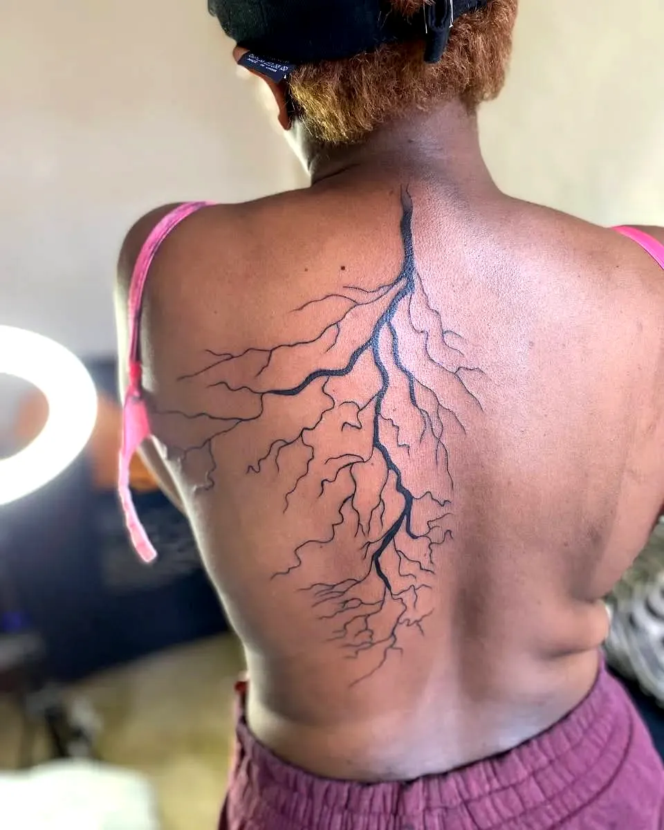 Organic Black Lightning Bolt Back Tattoo