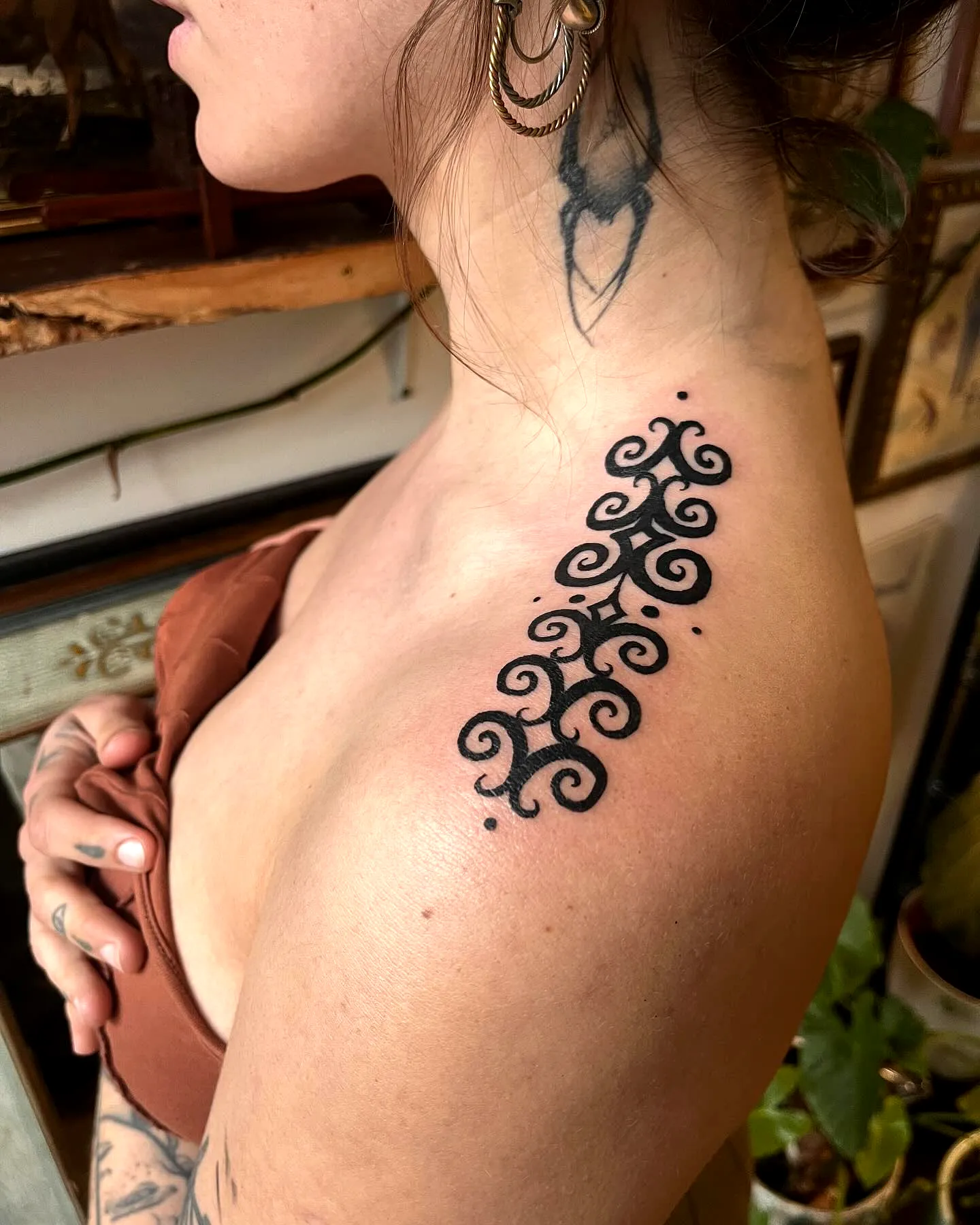 Ornamental Black Swirl Shoulder Tattoo