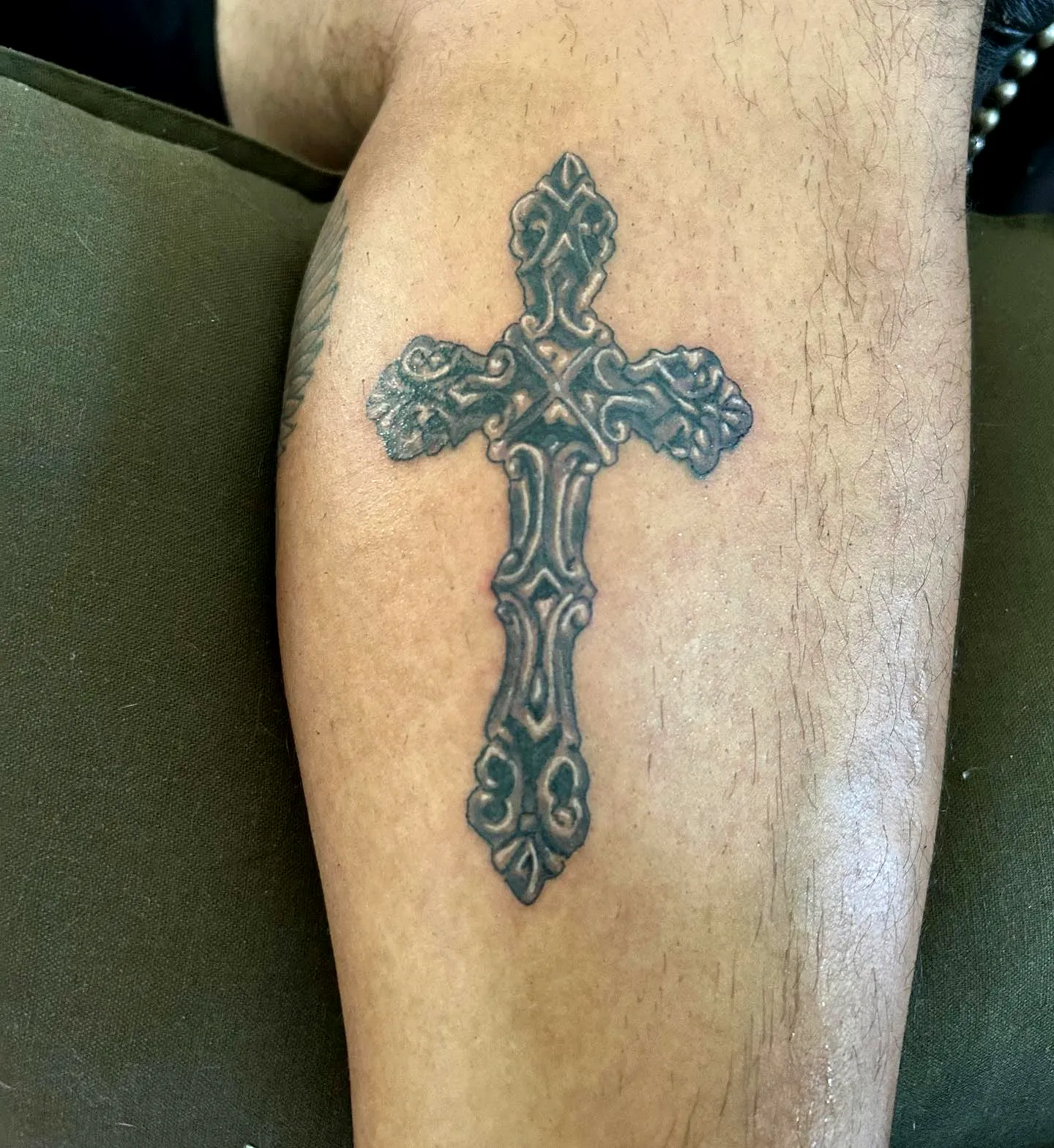 Ornate Cross Calf Tattoo in Black Ink