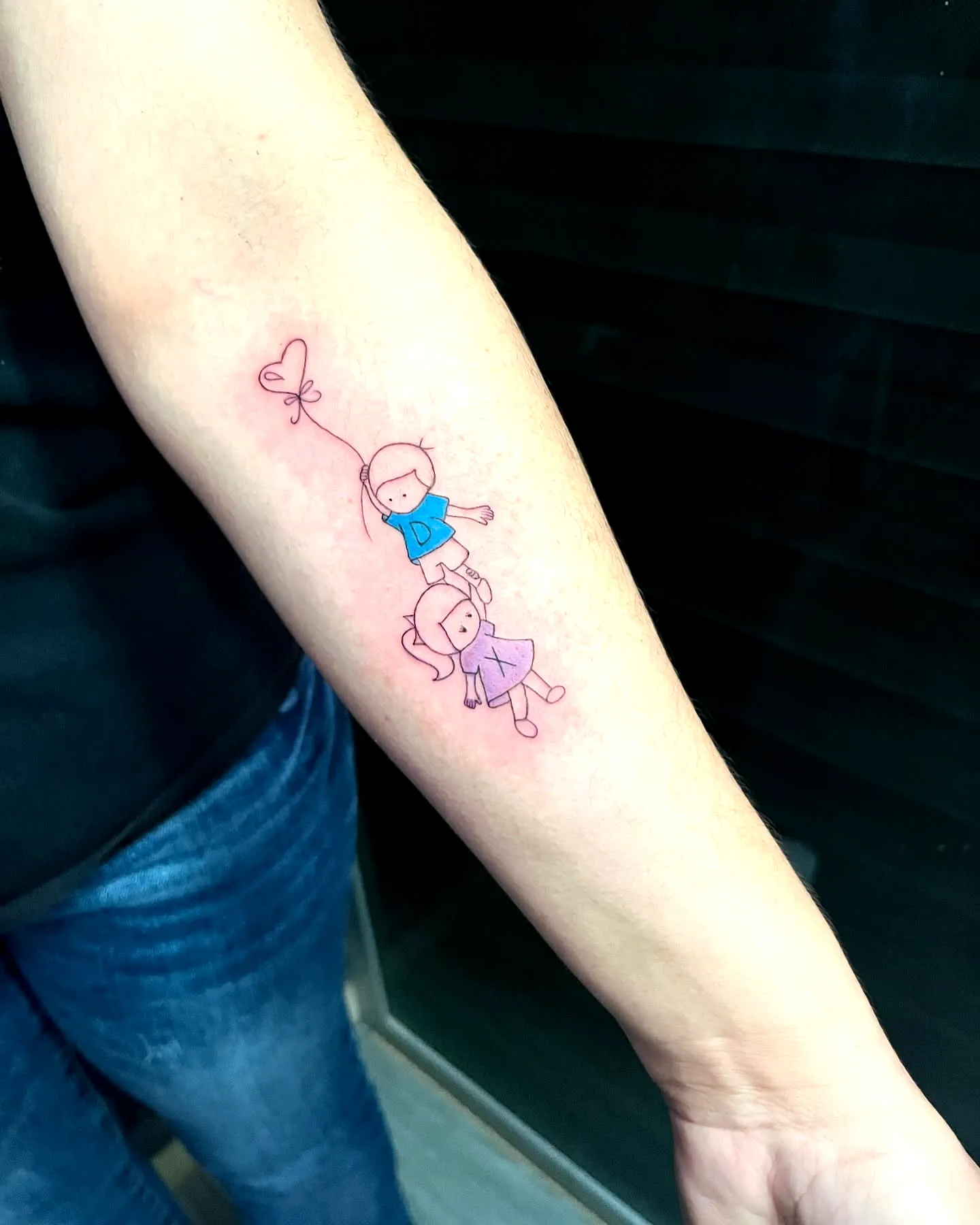 Pastel Cartoon Girls Forearm Tattoo