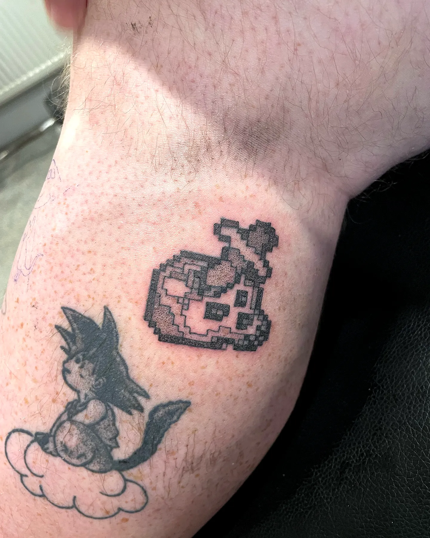 Pixelated Duck Inner Elbow Tattoo