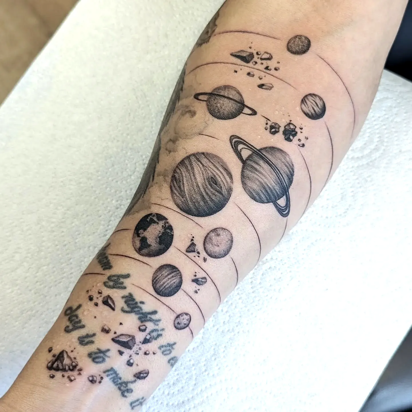 Planets Forearm Tattoo in Black and Gray