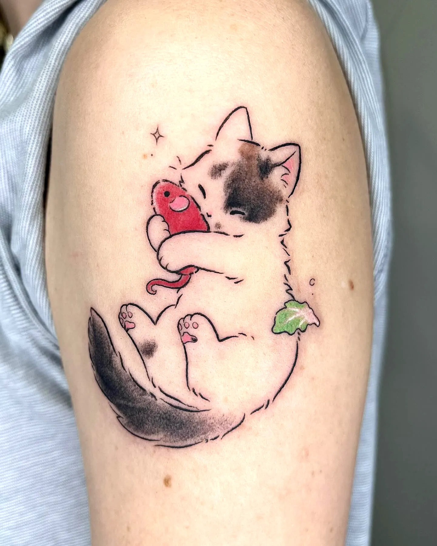 Playful Cat Arm Tattoo with Mouse Toy