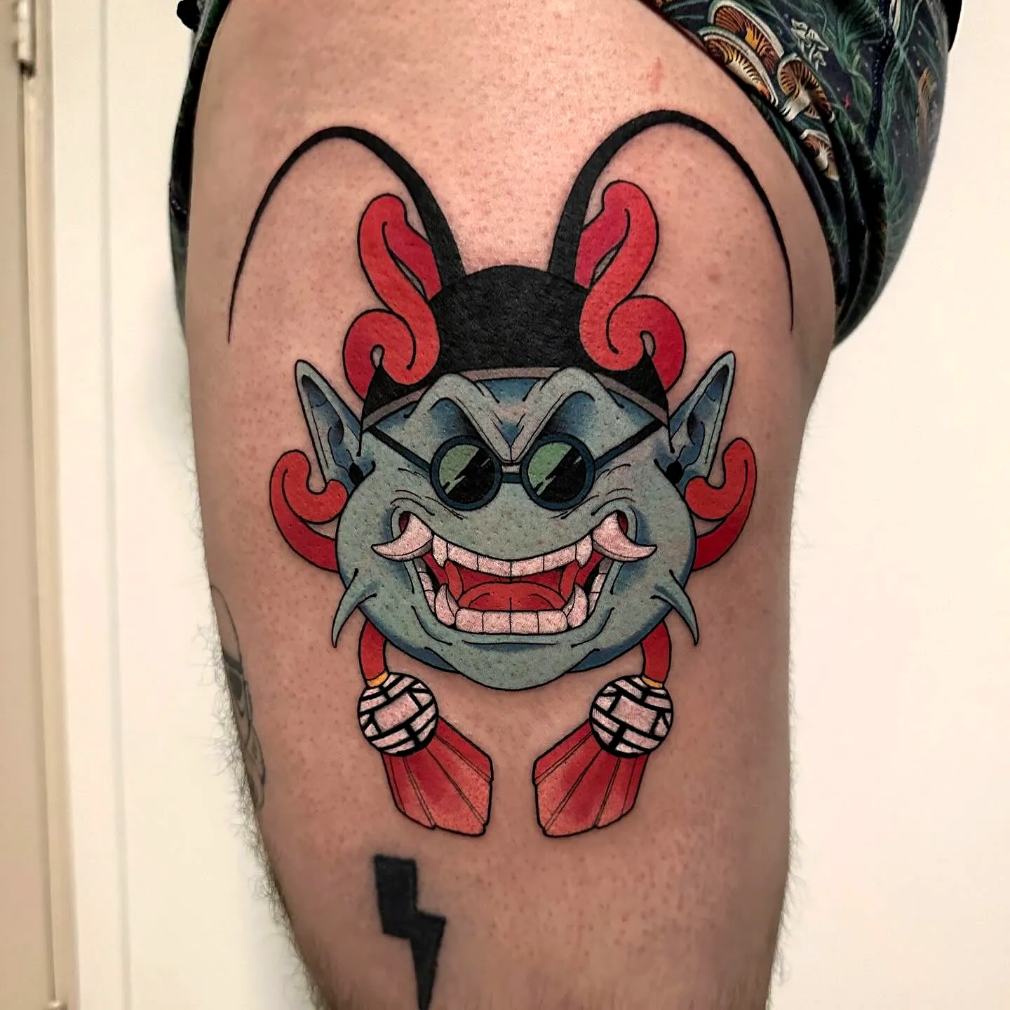 Playful Goblin Thigh Tattoo