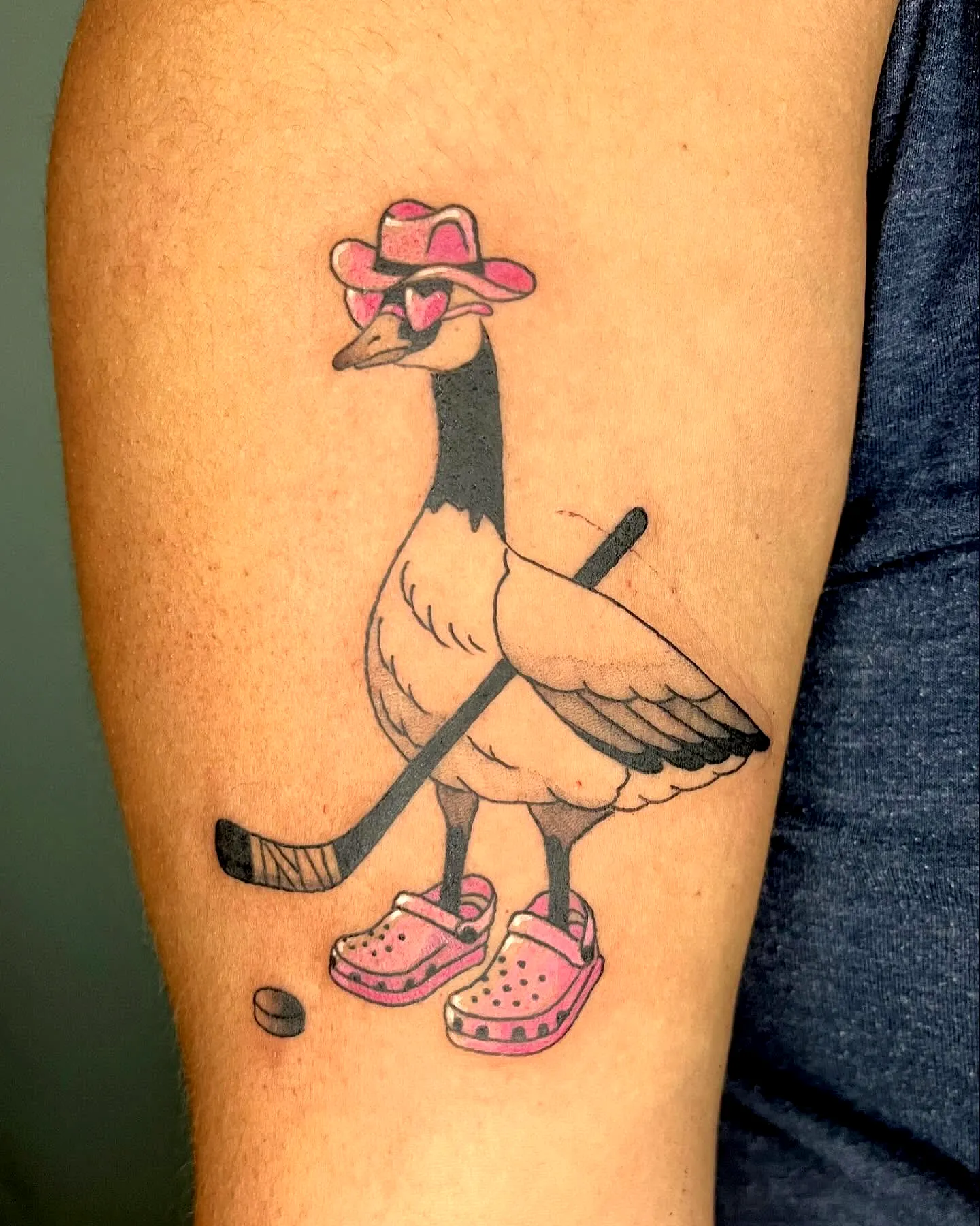 Playful Goose Arm Tattoo in Pink and Tan