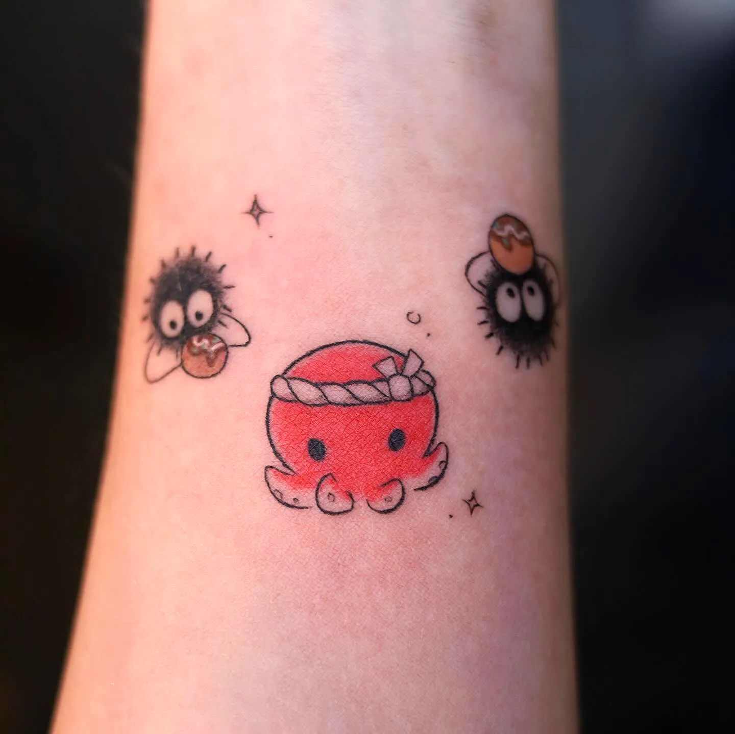Playful Octopus Arm Tattoo