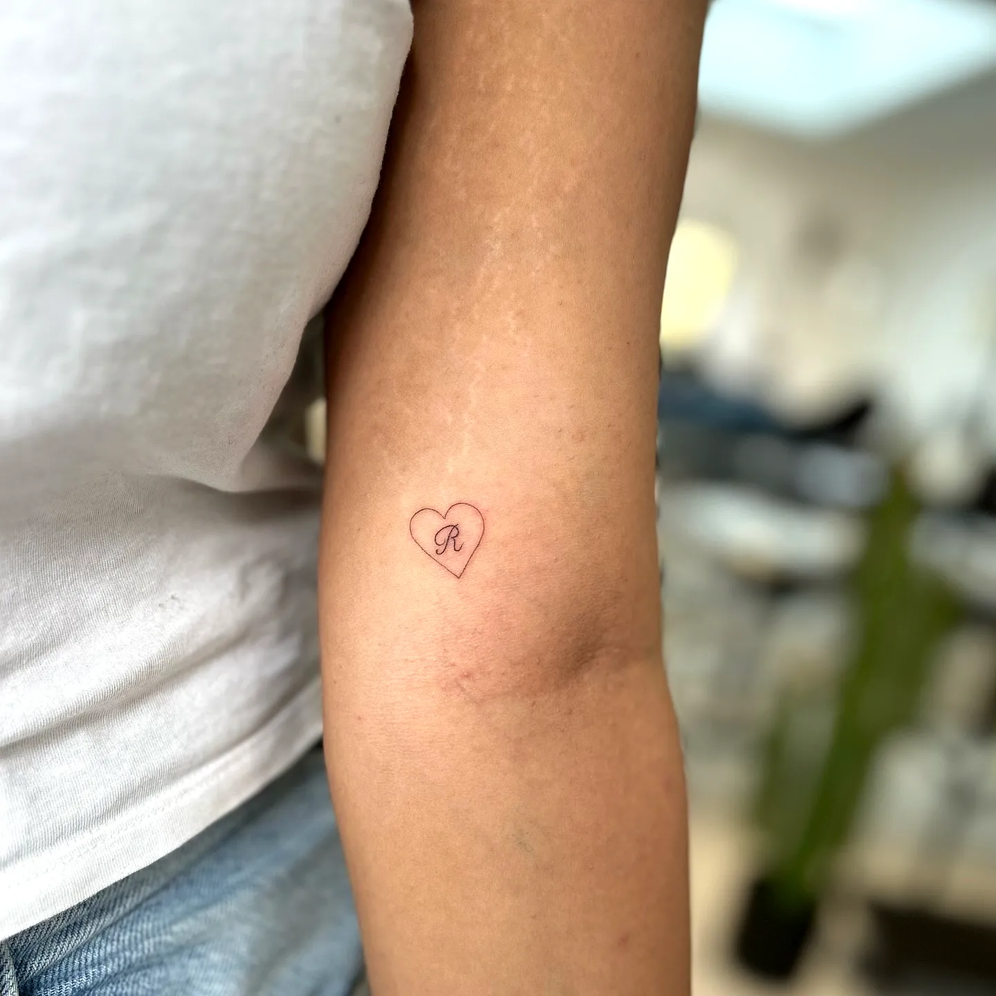 Purple Heart Initial Forearm Tattoo