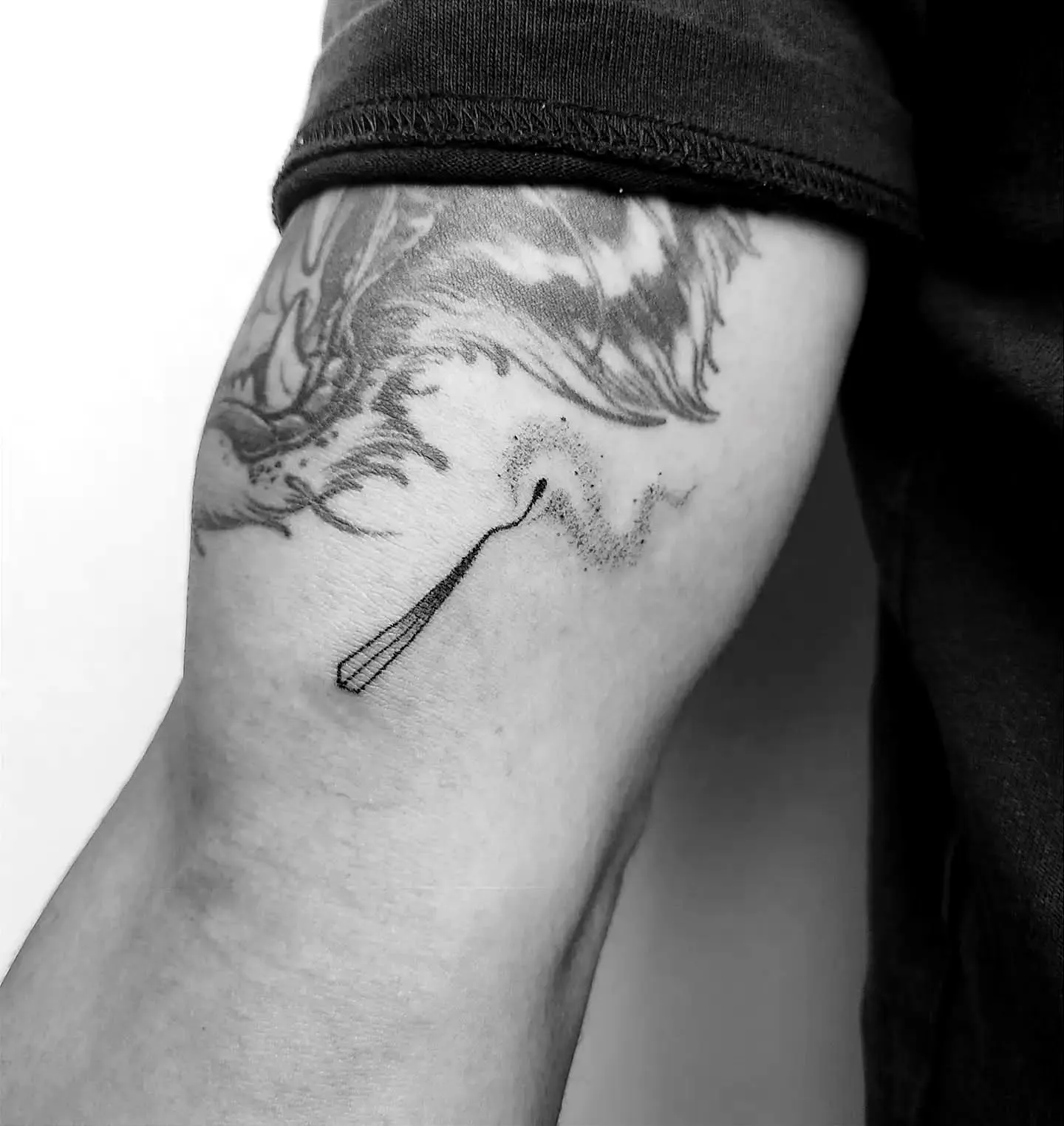Razor Blade Forearm Tattoo with Waves