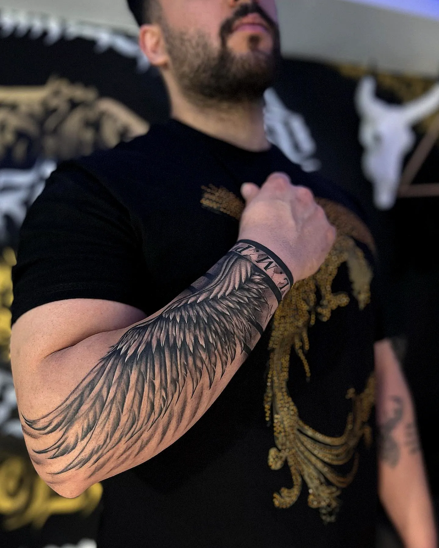 Realistic Black and Gray Wings Forearm Tattoo