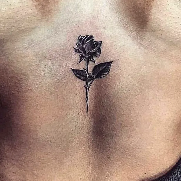Realistic Black Rose Chest Tattoo