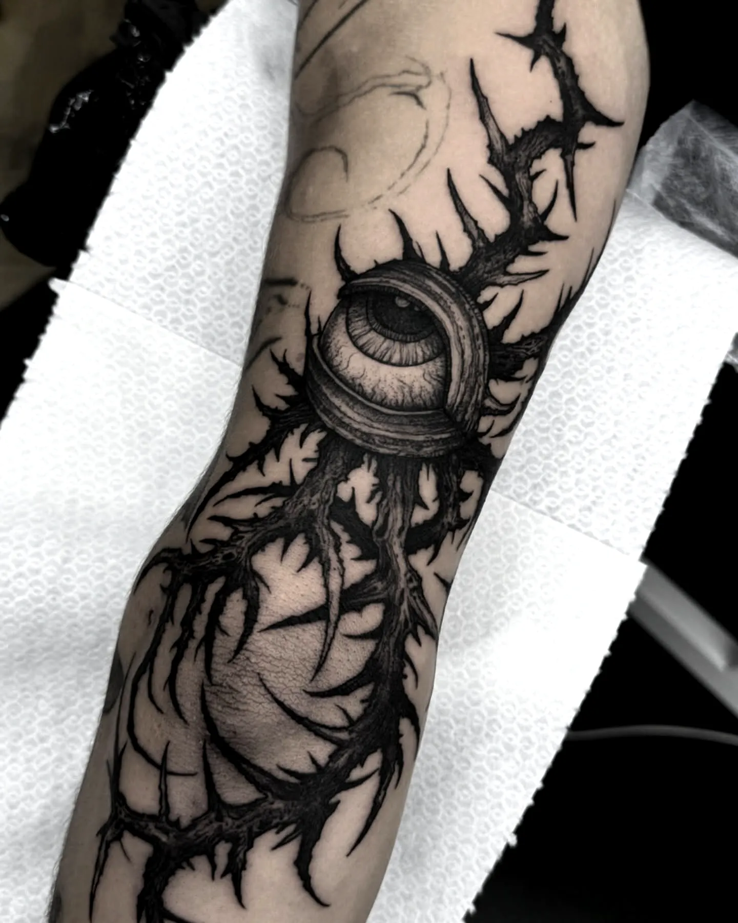 Realistic Eye Thorn Forearm Tattoo