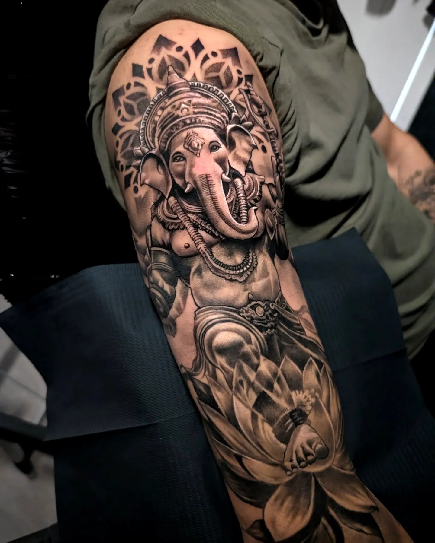 Realistic Ganesha Lotus Tattoo