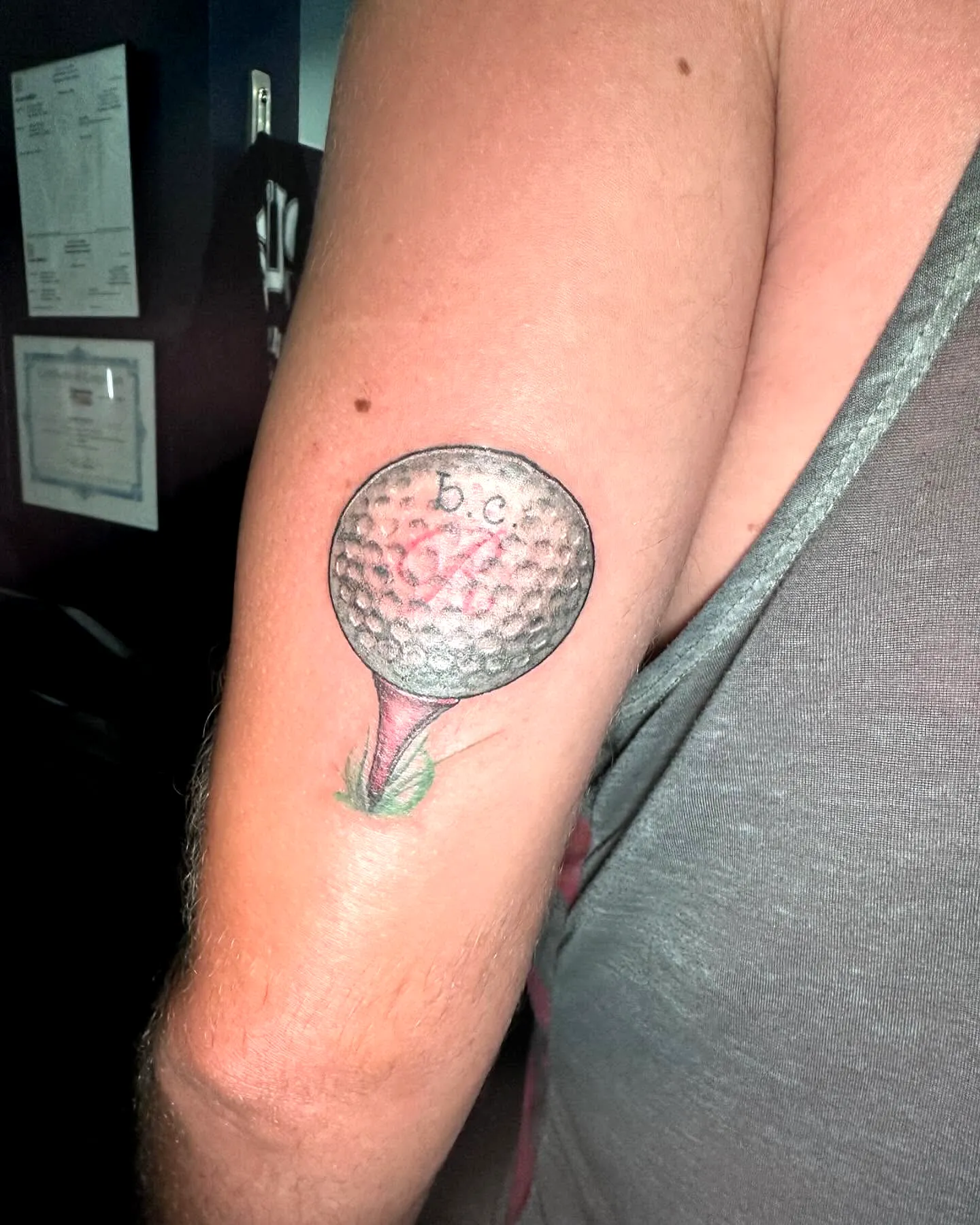 Realistic Golf Ball Upper Arm Tattoo