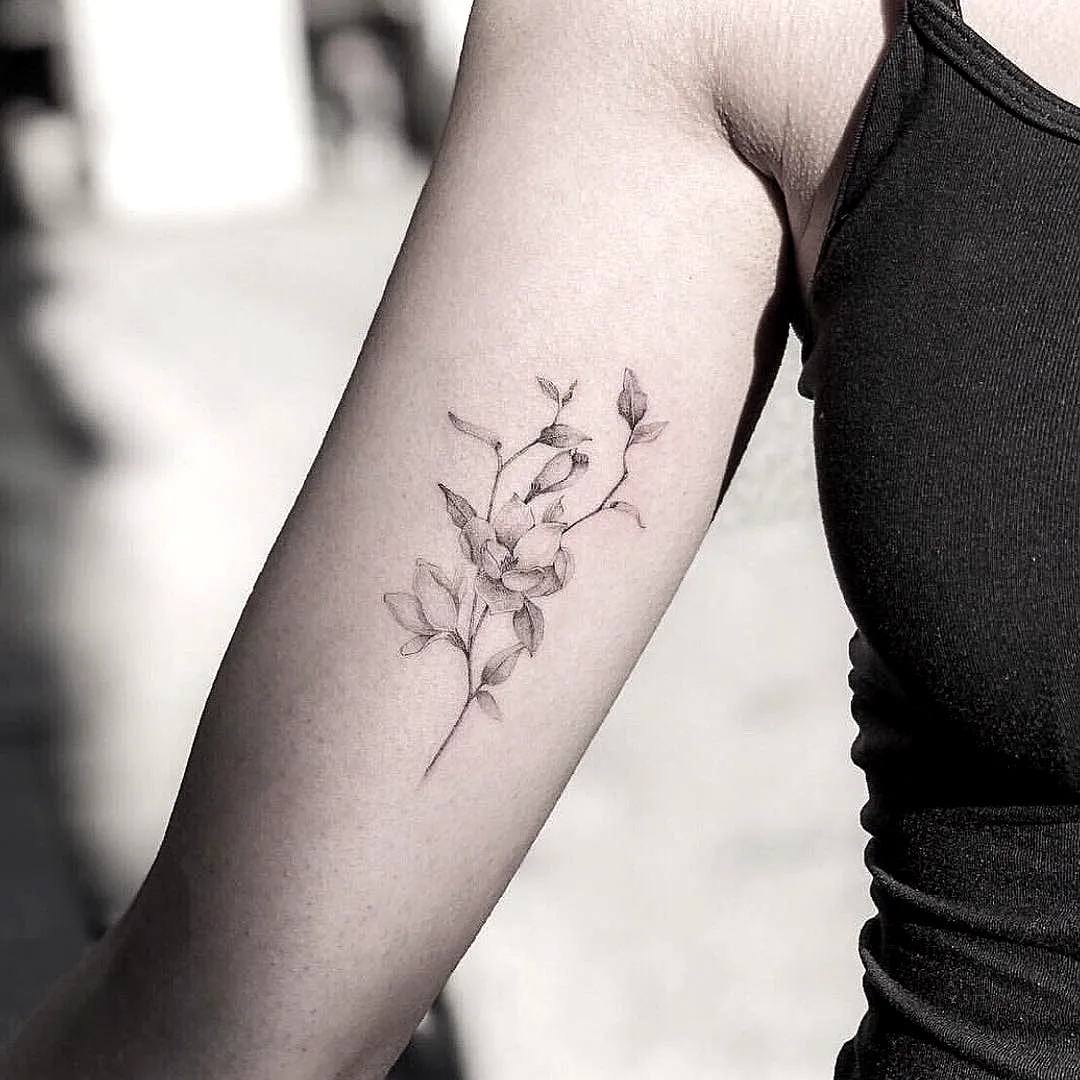 Realistic Jasmine Upper Arm Tattoo
