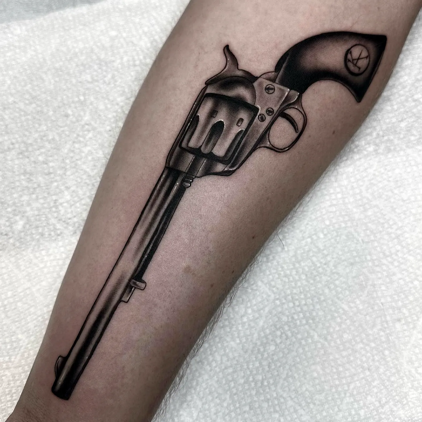 Realistic Revolver Forearm Tattoo