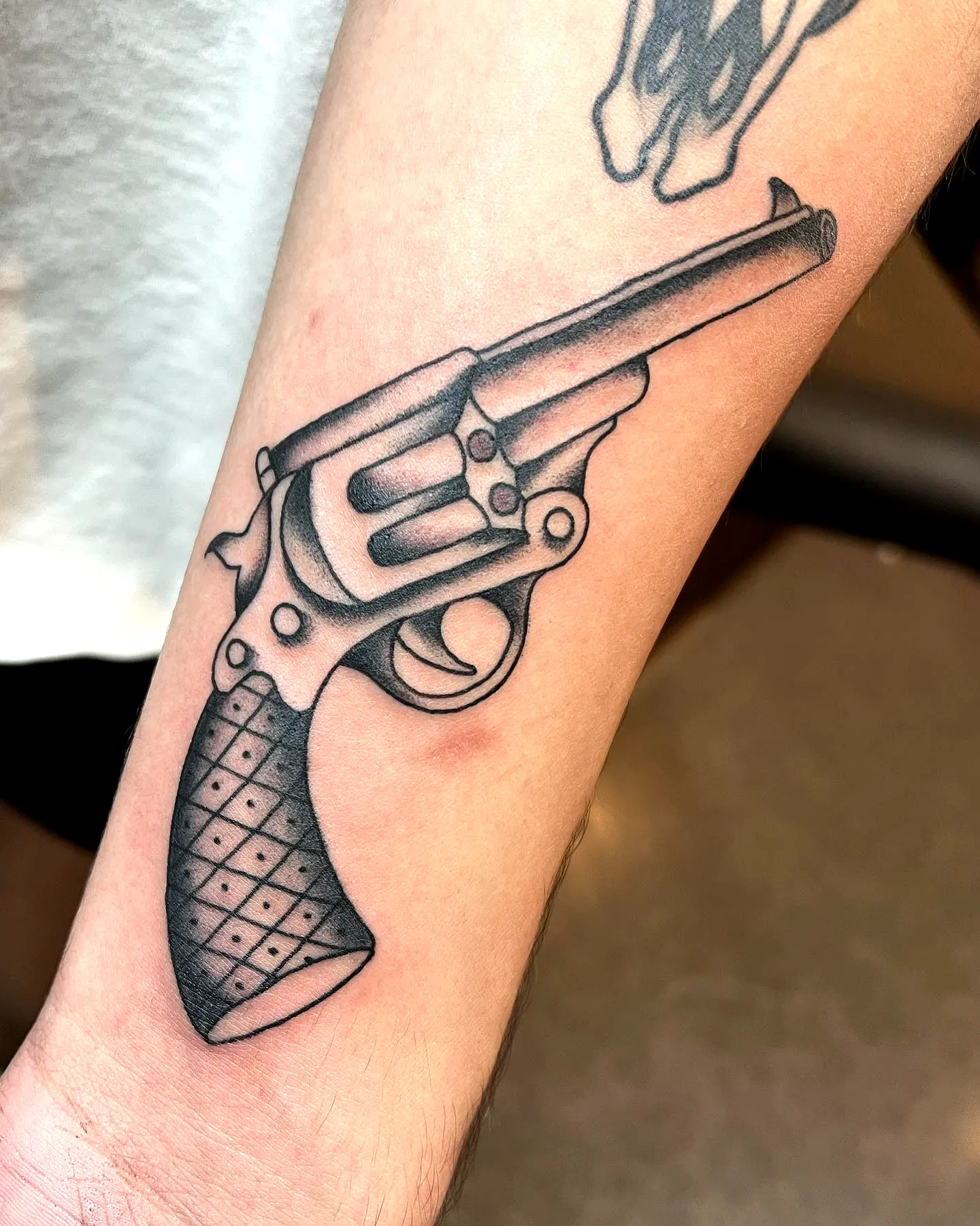 Realistic Revolver Forearm Tattoo