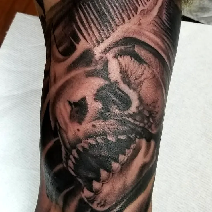 Realistic Skull Forearm Tattoo
