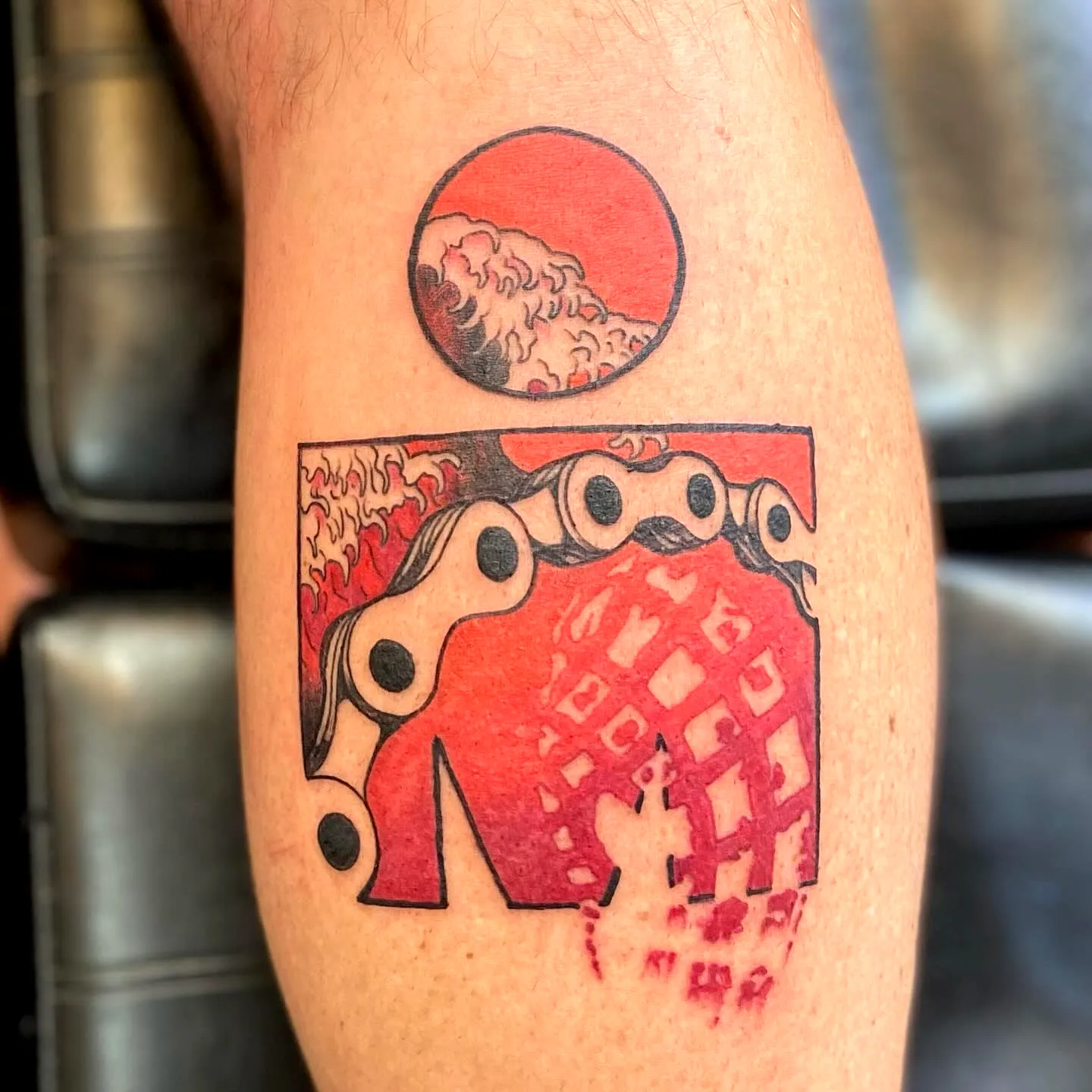 Red Octopus Tentacle Lower Leg Tattoo
