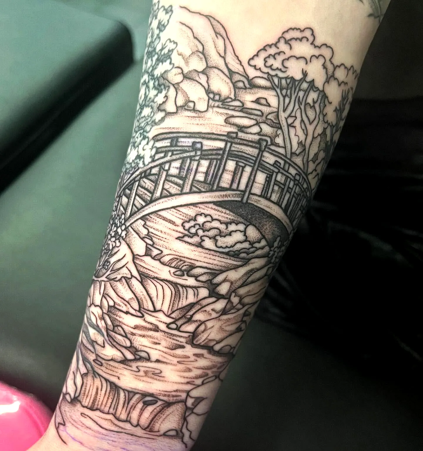 River Forearm Tattoo in Black Ink