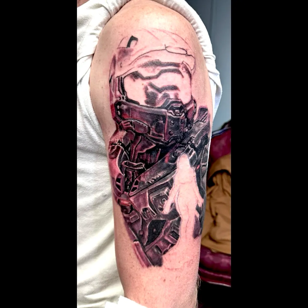 Robotic Figure Upper Arm Tattoo