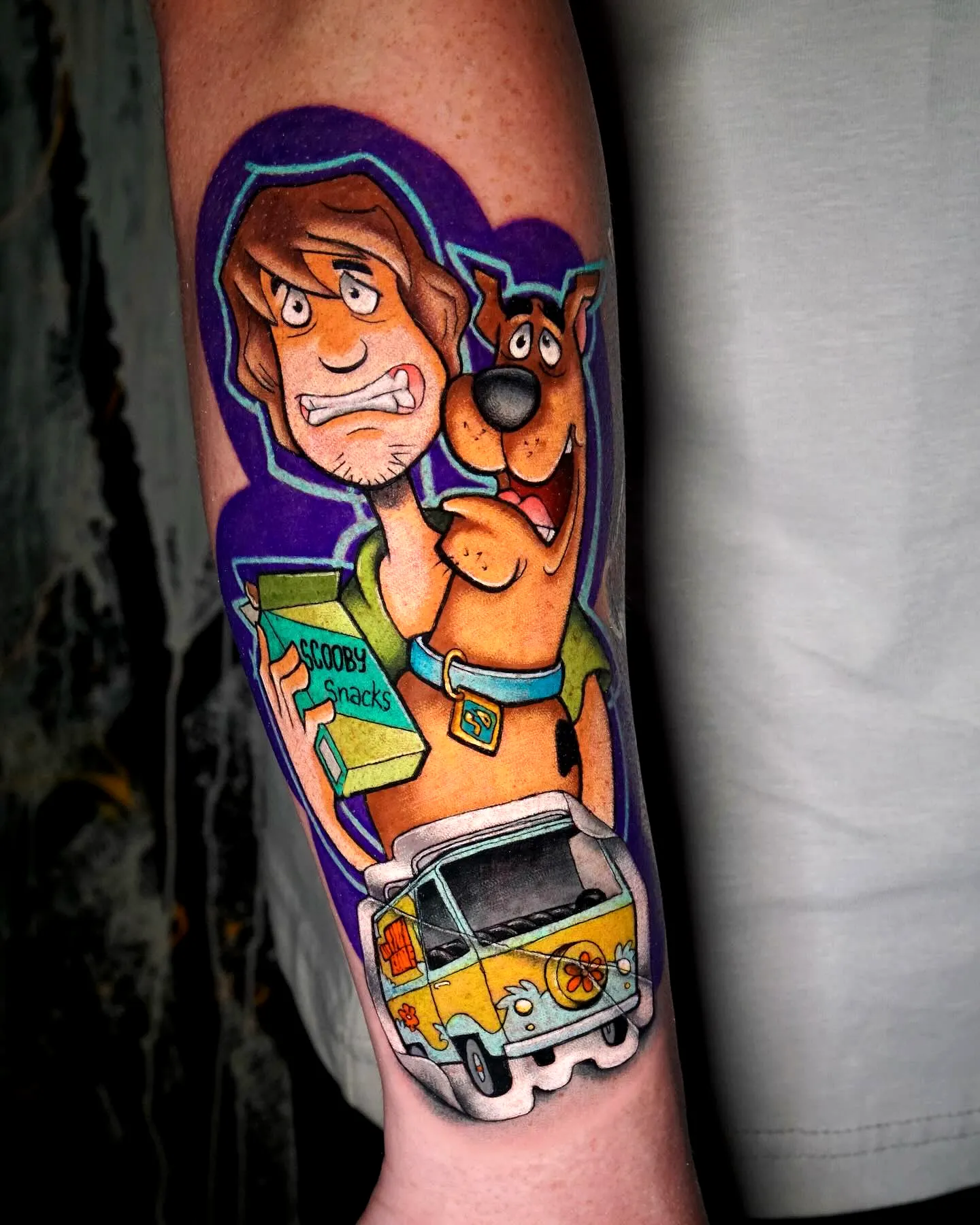 Scooby-Doo Arm Tattoo with Vibrant Colors