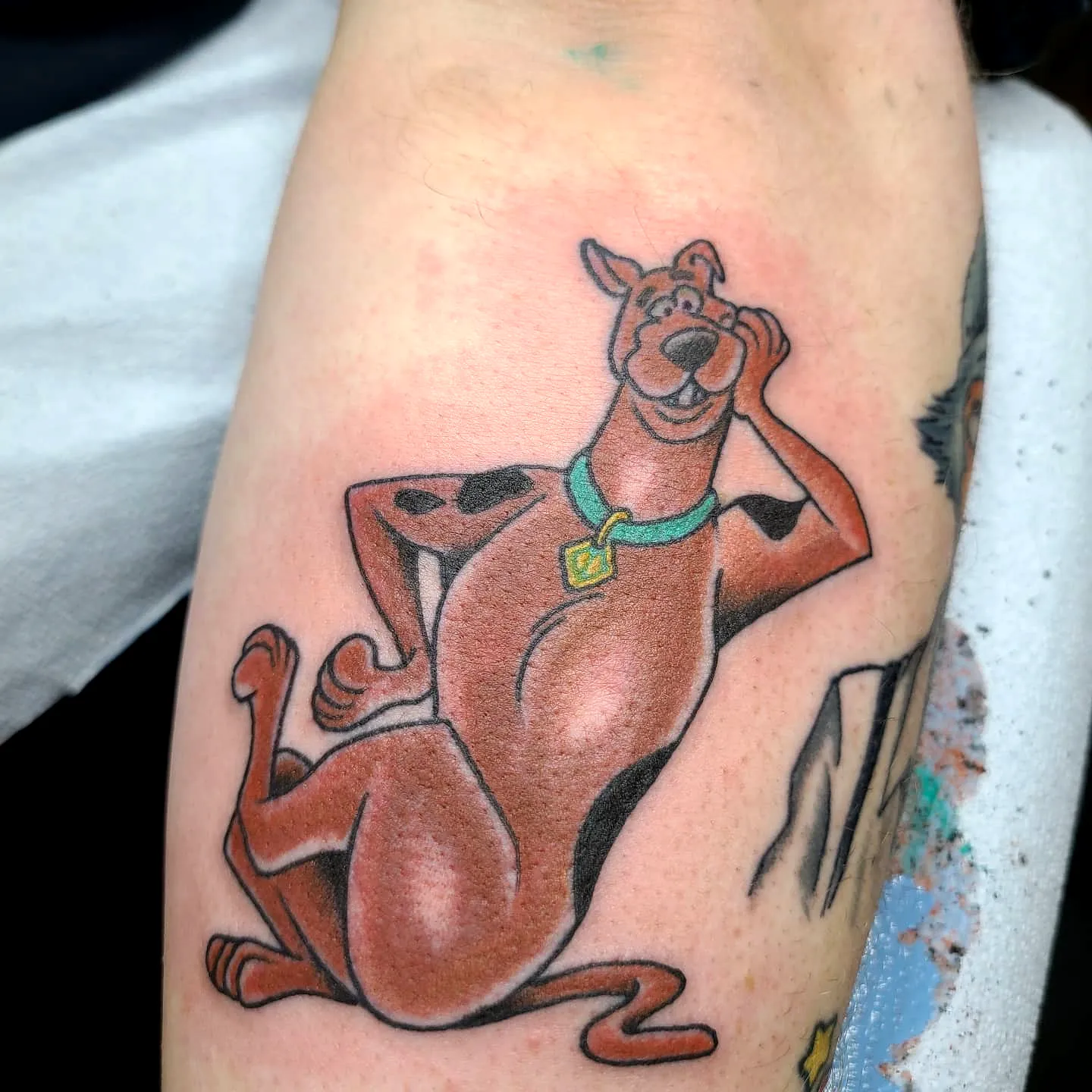 Scooby-Doo Playful Arm Tattoo