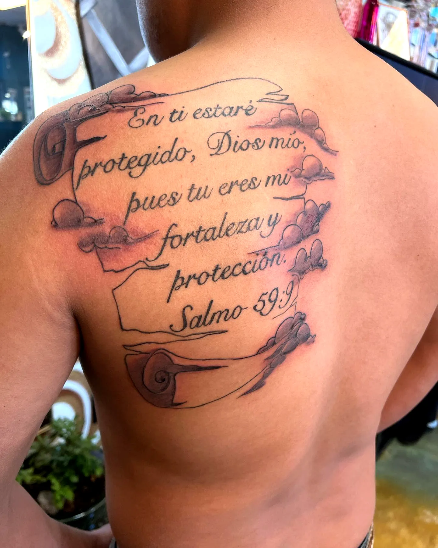 Scroll Upper Back Tattoo in Black and Gray