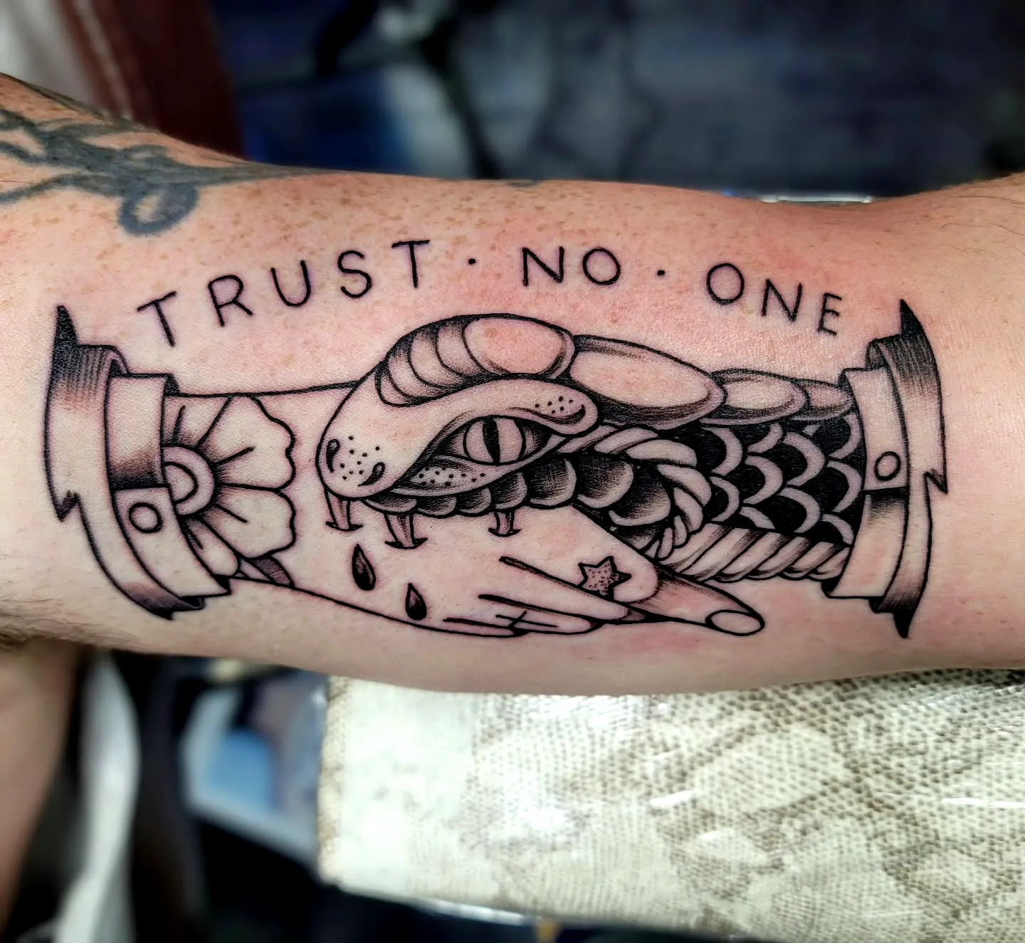 Serpent Hands Tattoo with Trust Message
