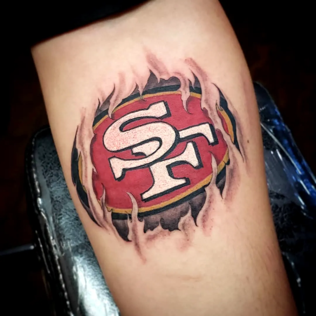 SF Logo Forearm Tattoo with Flames