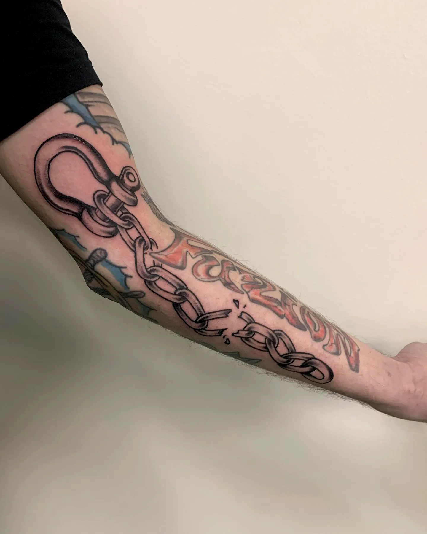 Shackle Chain Link Forearm Tattoo