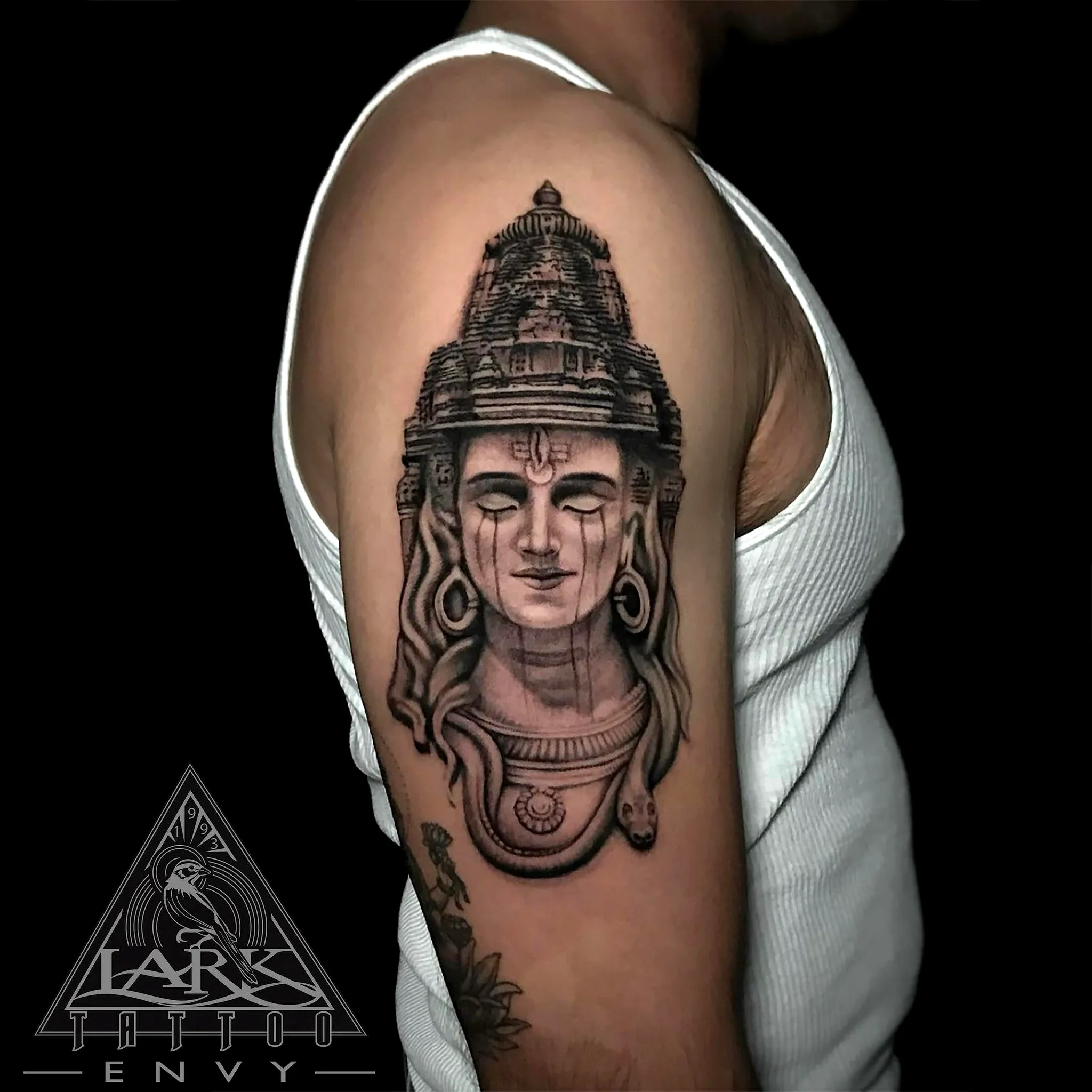 Shiva Upper Arm Tattoo in Black and Gray
