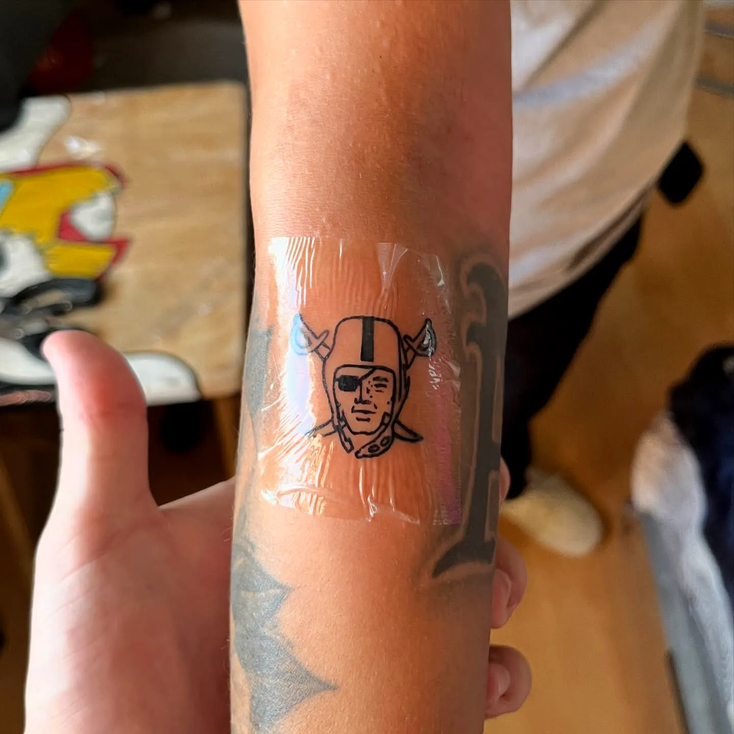 Simple Raiders Forearm Tattoo