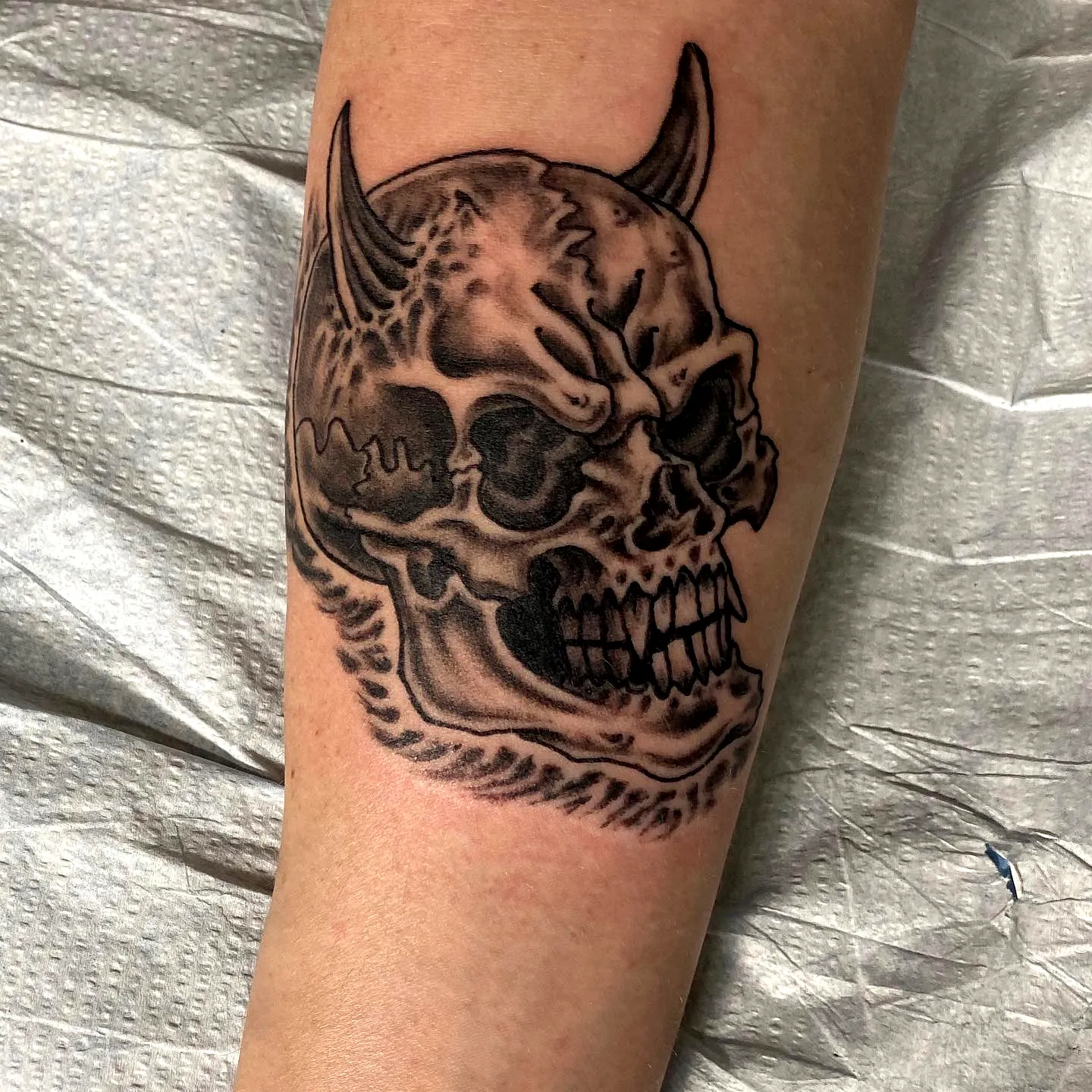 Skull Forearm Tattoo in Black and Grey
