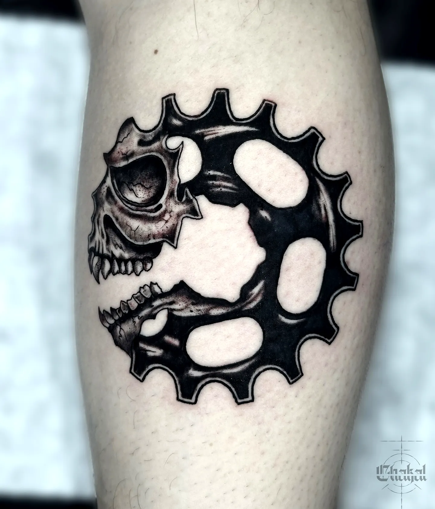 Skull Gear Upper Thigh Tattoo