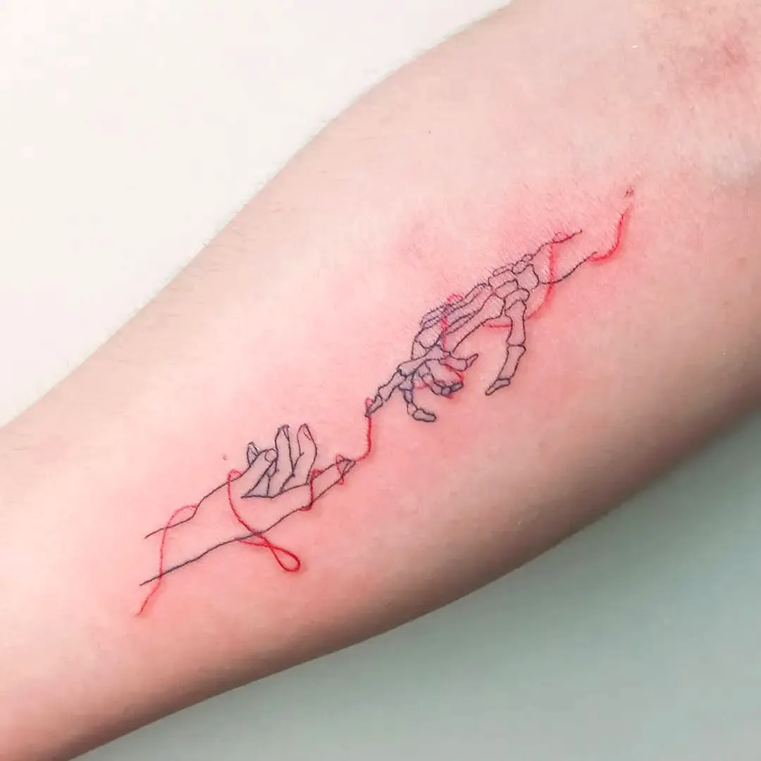 Soulmates Forearm Tattoo in Black and Red