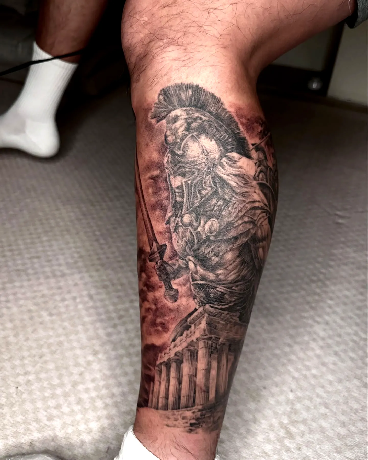 Spartan Warrior Leg Tattoo in Black and Grey