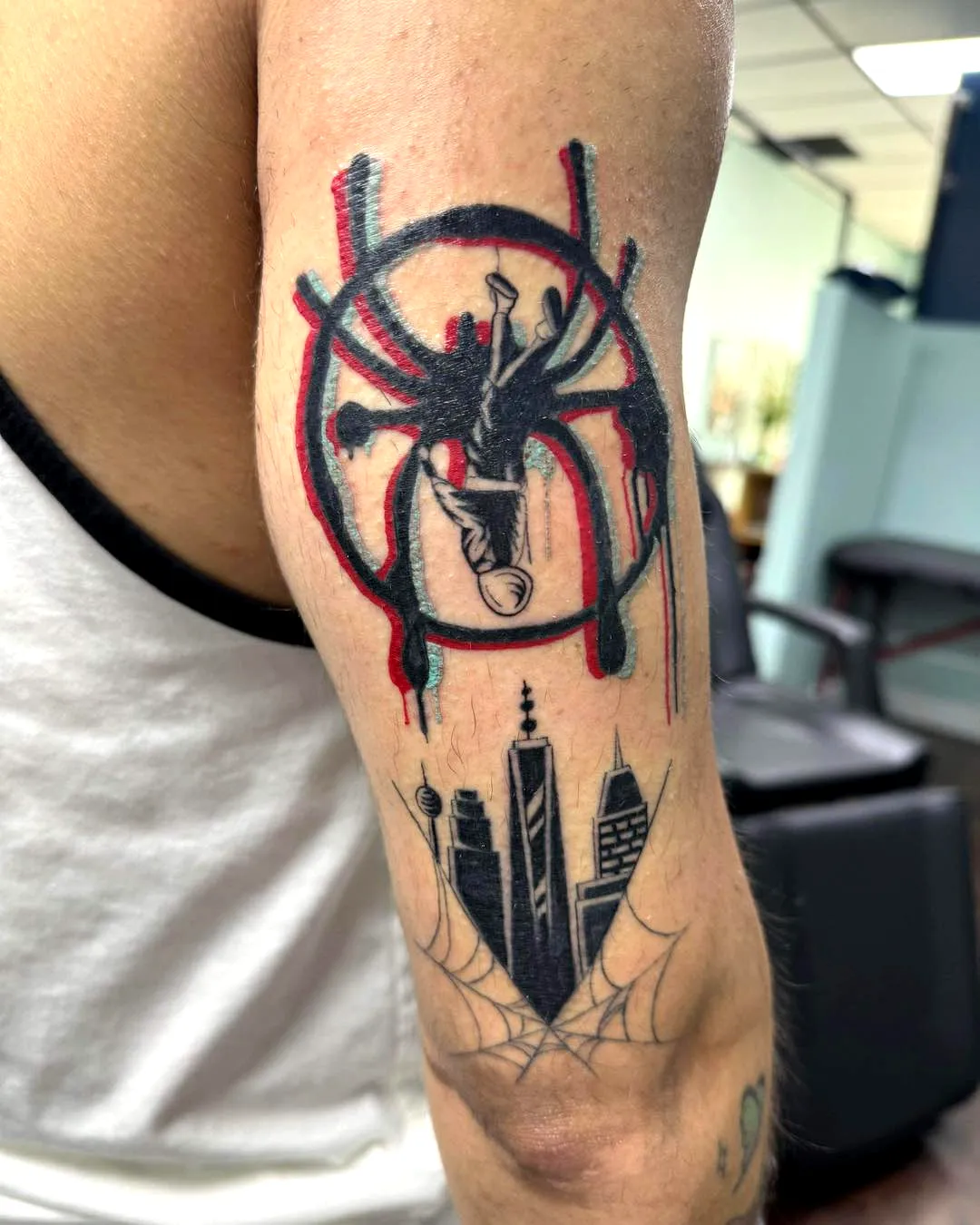Spider Web Arm Tattoo with Urban Elements