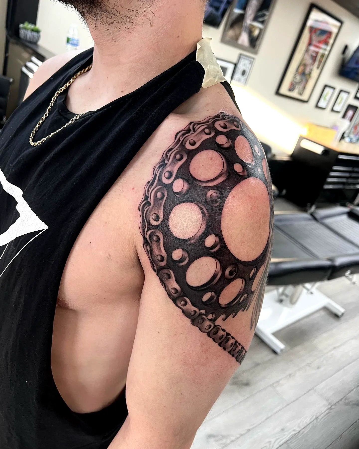 Sprockets Upper Arm Tattoo Design