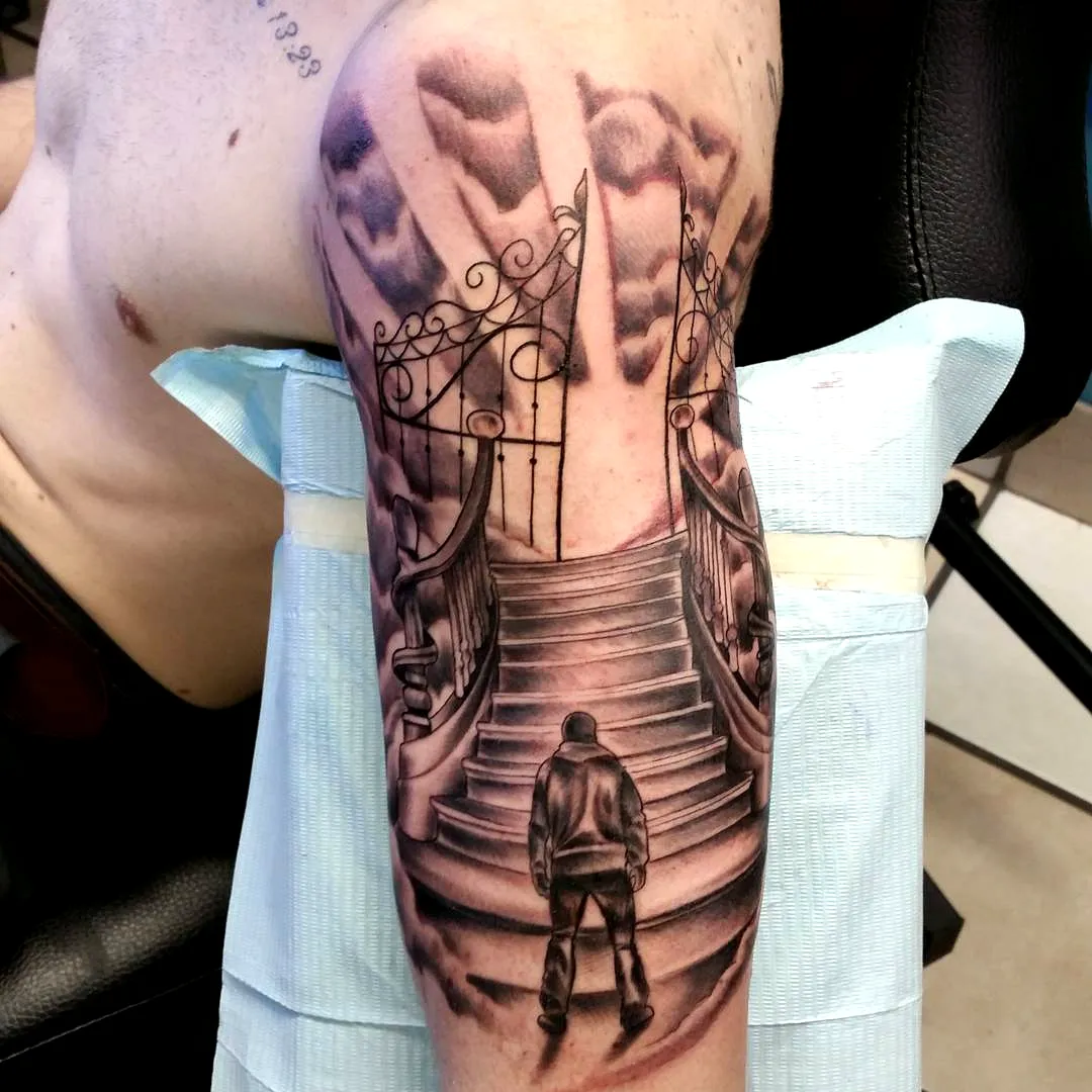 Staircase Gate Upper Arm Tattoo