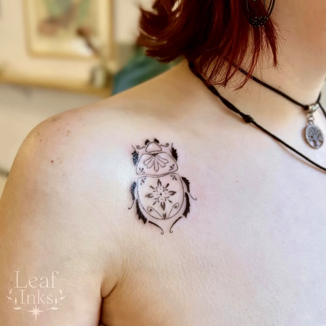 Stylized Beetle Shoulder Tattoo