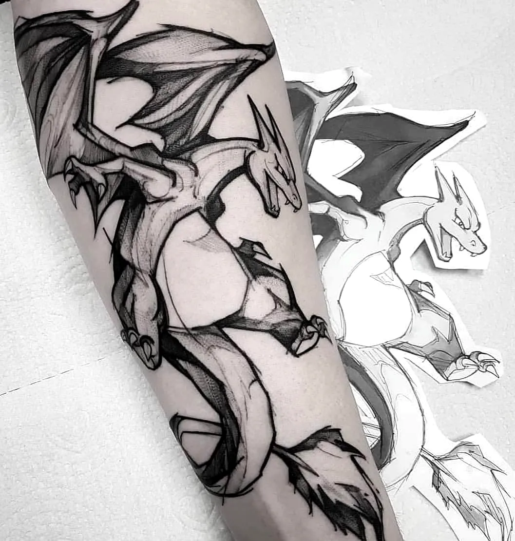 Stylized Charizard Arm Tattoo