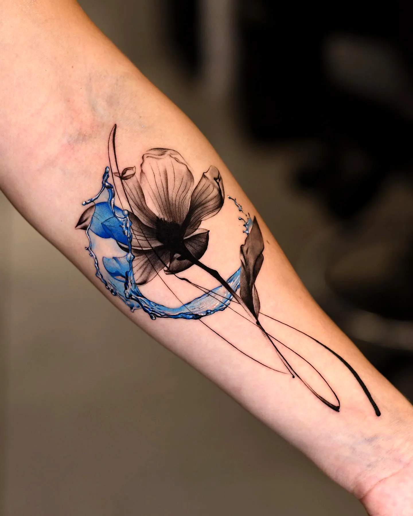 Stylized Flower Forearm Tattoo