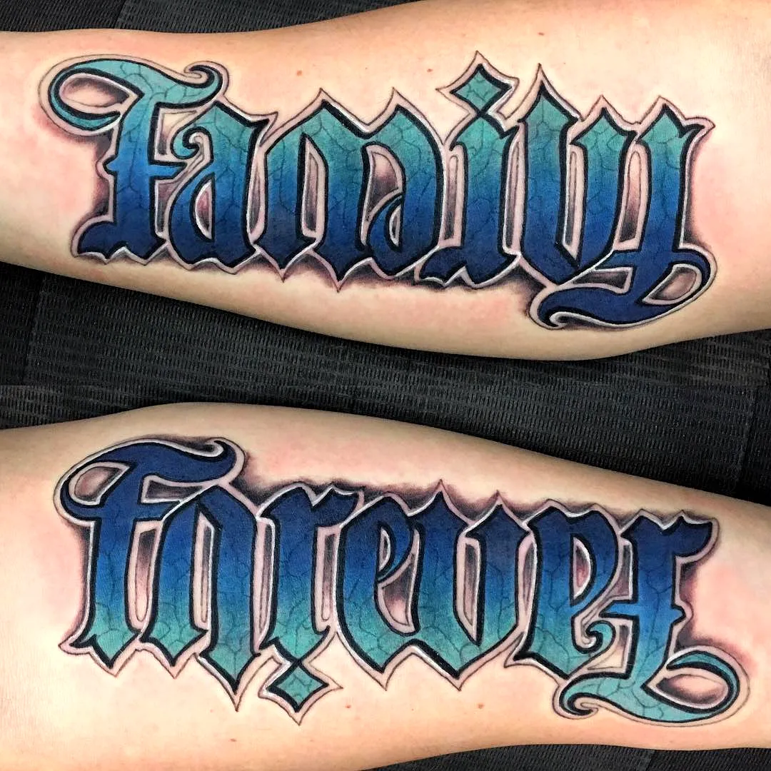 Stylized Forearm Tattoo in Blue Green